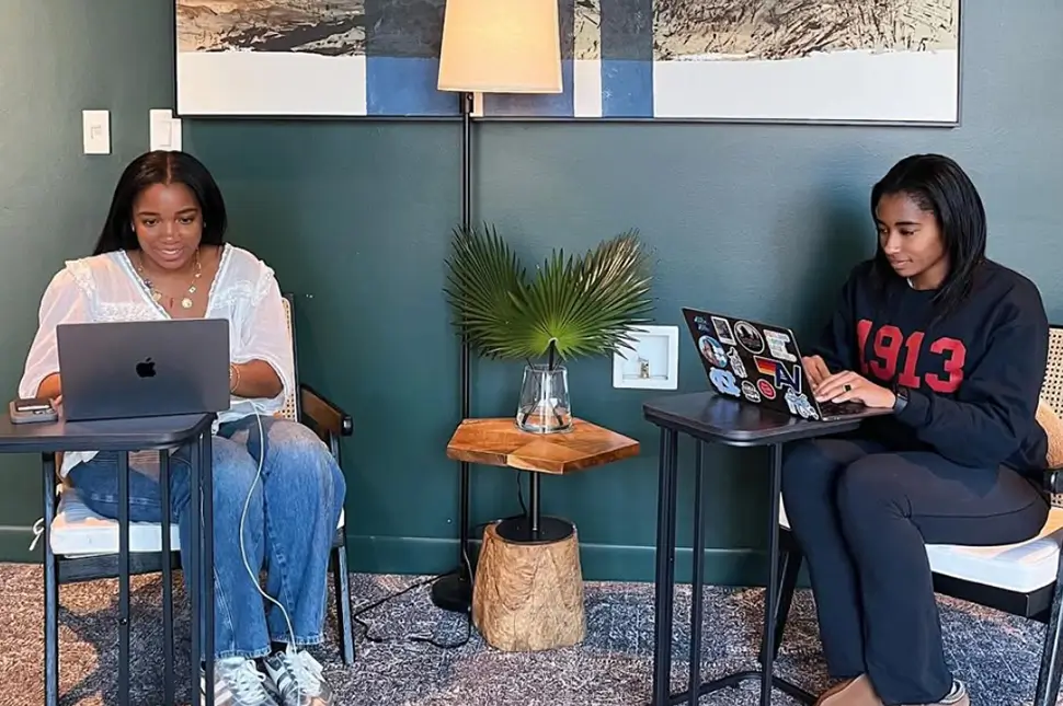 two young women studying